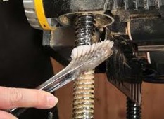 brushing your tools to clean them