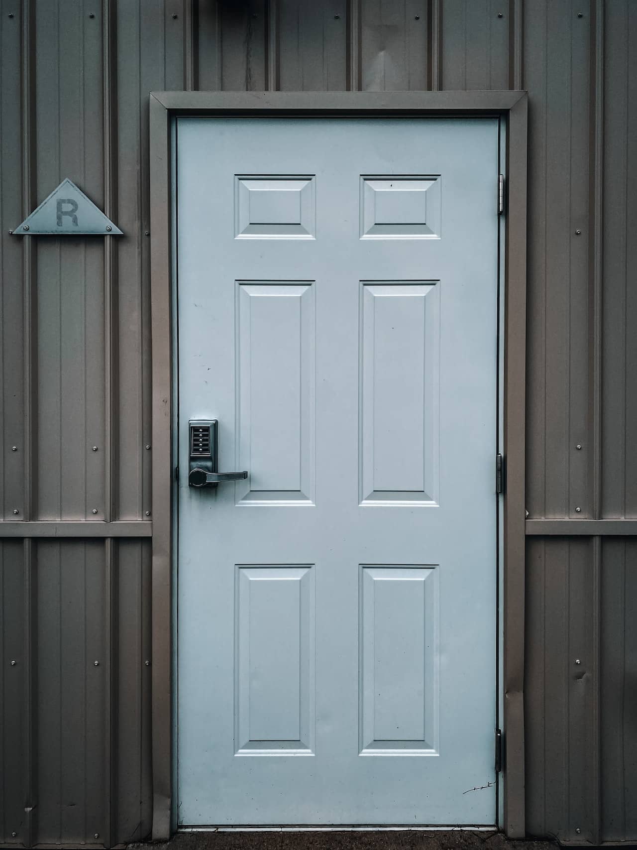 white door with power door lock